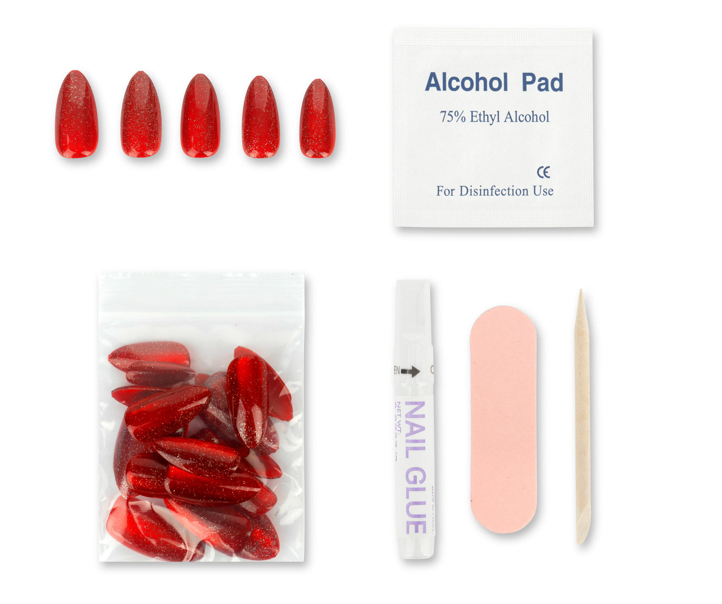 Set of red nail extensions, alcohol pad, nail glue, and a stick on a white background
